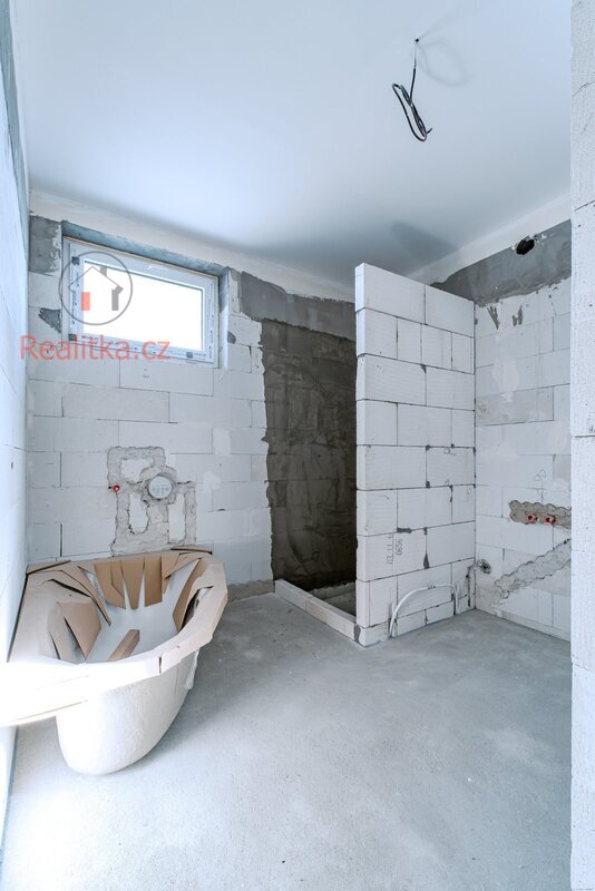 Prodej moderní novostavby dvojdomu ve Sluhách, okres Praha - východ